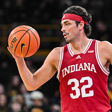 Indiana Hoosiers guard Trey Galloway (32) controls the ball against the Iowa Hawkeyes during the first half at Carver-Hawkeye Arena.