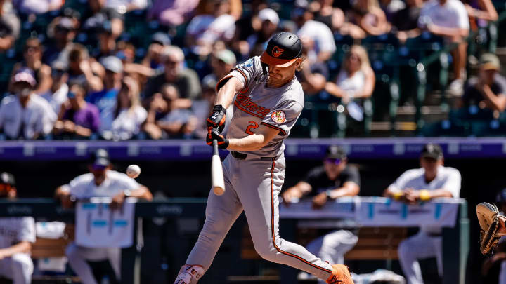 Sep 1, 2024; Denver, Colorado, USA; Baltimore Orioles shortstop Gunnar Henderson (2) hits an RBI single in the first inning against the Colorado Rockies at Coors Field.