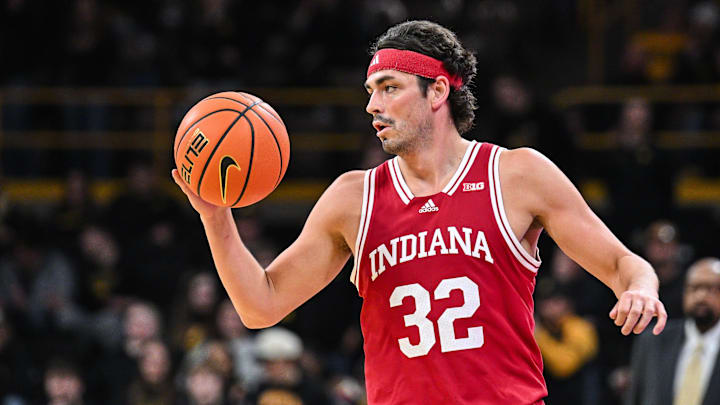 Indiana Hoosiers guard Trey Galloway (32) controls the ball against the Iowa Hawkeyes during the first half at Carver-Hawkeye Arena. Indiana Hoosiers guard Trey Galloway (32) controls the ball against the Iowa Hawkeyes during the first half at Carver-Hawkeye Arena.