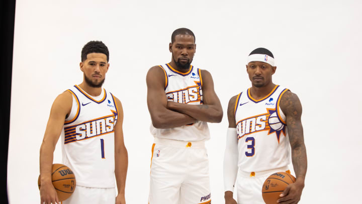 Oct 2, 2023; Phoenix, AZ, USA; Phoenix Suns guard Devin Booker (1), forward Kevin Durant (35) and guard Bradley Beal (3) pose for a portrait during media day at Footprint Center. Mandatory Credit: Mark J. Rebilas-USA TODAY Sports