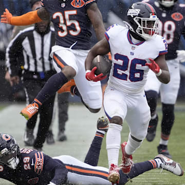 Devin Singletary keeps going up the sidelines after hurdled Tyrique Stevenson and broke a tackle attempt by Noah Sewell for a 41-yard pass play, longest in Sunday's game.
