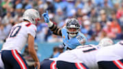 Oct 19, 2025; Nashville, Tennessee, USA; Tennessee Titans defensive tackle Jeffery Simmons (98) gestures before New England Patriots quarterback Drake Maye (10) snaps the ball during the first half at Nissan Stadium. Mandatory Credit: Steve Roberts-Imagn Images
