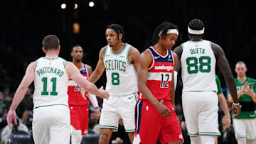 Nov 5, 2025; Boston, Massachusetts, USA; Boston Celtics forward Josh Minott (8) congratulates guard Payton Pritchard (11) after a play against the Washington Wizards in the second quarter at TD Garden. Mandatory Credit: David Butler II-Imagn Images