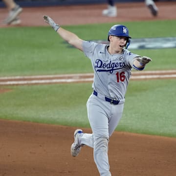 Nov 1, 2025; Toronto, Ontario, CAN; Los Angeles Dodgers catcher Will Smith (16) runs after hitting a home run against the Toronto Blue Jays in the eleventh inning during game seven of the 2025 MLB World Series at Rogers Centre. Mandatory Credit: Kevin Sousa-Imagn Images