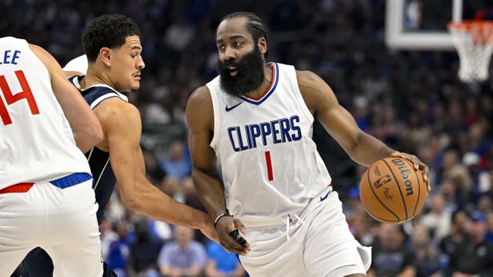 Apr 26, 2024; Dallas, Texas, USA; LA Clippers guard James Harden (1) looks to move the ball past Dallas Mavericks guard Josh Green (8) during the second quarter during game three of the first round for the 2024 NBA playoffs at the American Airlines Center. Mandatory Credit: Jerome Miron-USA TODAY Sports