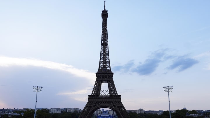 Jul 30, 2024; Paris, France; General view of the Eiffel Tower during a beach volleyball preliminary match during the Paris 2024 Olympic Summer Games at Eiffel Tower Stadium. 