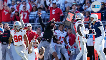 Ohio State Buckeyes quarterback Will Howard (18) and head coach Ryan Day react as Howard slides for a first down late in the second half of the NCAA football game at Beaver Stadium in University Park, Pa. on Saturday, Nov. 2, 2024. Ohio State won 20-13.