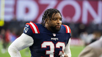 Dec 15, 2024; Glendale, Arizona, USA; New England Patriots linebacker Anfernee Jennings (33) against the Arizona Cardinals at State Farm Stadium. Mandatory Credit: Mark J. Rebilas-Imagn Images
