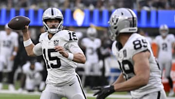 Oct 20, 2024; Inglewood, California, USA; Las Vegas Raiders quarterback Gardner Minshew (15) throws a pass to tight end Brock Bowers (89) during the second half against the Los Angeles Rams at SoFi Stadium. Mandatory Credit: Alex Gallardo-Imagn Images
