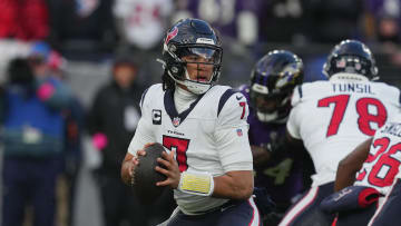 Jan 20, 2024; Baltimore, MD, USA; Houston Texans quarterback C.J. Stroud (7) drops back to pass against the Baltimore Ravens in the first half of a 2024 AFC divisional round game at M&T Bank Stadium. Mandatory Credit: Mitch Stringer-USA TODAY Sports