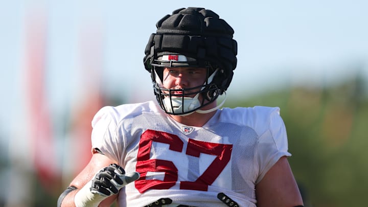 Aug 8, 2023; Tampa, FL, USA;  Tampa Bay Buccaneers guard Luke Goedeke (67) participates in training camp at AdventHealth Training Center. Mandatory Credit: Nathan Ray Seebeck-Imagn Images