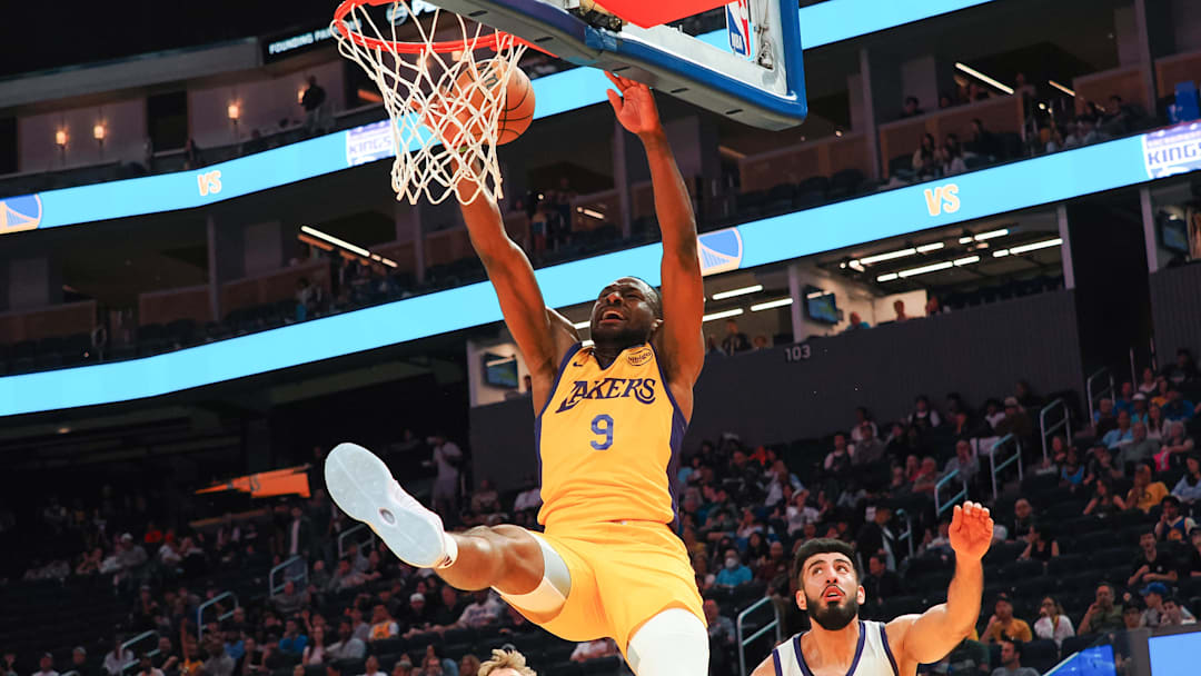 Jul 6, 2024; San Francisco, CA, USA; Los Angeles Lakers guard Bronny James Jr. (9) misses a dunk opportunity after being fouled by Sacramento Kings center Fardaws Aimaq (43) during the third quarter at Chase Center. Mandatory Credit: Kelley L Cox-USA TODAY Sports