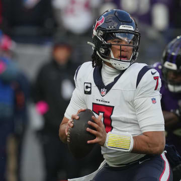 Jan 20, 2024; Baltimore, MD, USA; Houston Texans quarterback C.J. Stroud (7) drops back to pass against the Baltimore Ravens in the first half of a 2024 AFC divisional round game at M&T Bank Stadium. Mandatory Credit: Mitch Stringer-USA TODAY Sports