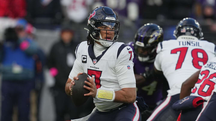 Jan 20, 2024; Baltimore, MD, USA; Houston Texans quarterback C.J. Stroud (7) drops back to pass against the Baltimore Ravens in the first half of a 2024 AFC divisional round game at M&T Bank Stadium. Mandatory Credit: Mitch Stringer-USA TODAY Sports