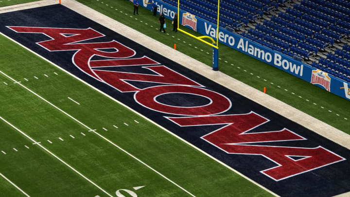 The Arizona Wildcats logo in the end zone at Alamodome