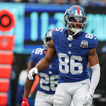 Dec 29, 2024; East Rutherford, New Jersey, USA; New York Giants wide receiver Darius Slayton (86) celebrates after scoring a touchdown reception during the first half against the Indianapolis Colts at MetLife Stadium.  