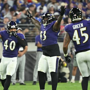Aug 7, 2025; Baltimore, Maryland, USA; Baltimore Ravens defensive tackle Aeneas Peebles (93) celebrates after batting down a pass at the line of scrimmage against the Indianapolis Colts during the third quarter at M&T Bank Stadium. Mandatory Credit: Rafael Suanes-Imagn Images