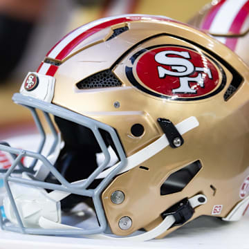 Jan 5, 2025; Glendale, Arizona, USA; Detailed view of a San Francisco 49ers helmet at State Farm Stadium. Mandatory Credit: Mark J. Rebilas-Imagn Images