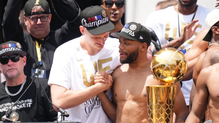 Jun 15, 2023; Denver, CO, USA; Denver Nuggets center Nikola Jokic (15) and Denver Nuggets forward Bruce Brown (11) during the championship parade after the Denver Nuggets won the 2023 NBA Finals. Mandatory Credit: Ron Chenoy-USA TODAY Sports