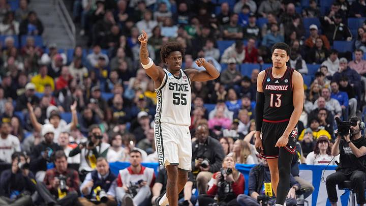 Mar 21, 2026; Buffalo, NY, USA; Michigan State Spartans forward Coen Carr (55) reacts after defeating the Louisville Cardinals during a second round game of the men's 2026 NCAA Tournament at Keybank Center. Mandatory Credit: Gregory Fisher-Imagn Images