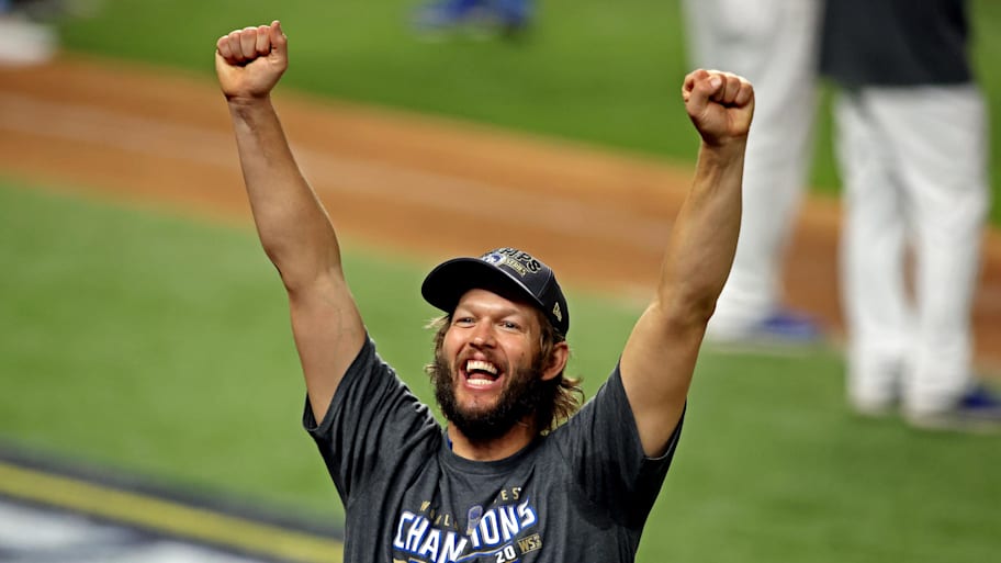 Los Angeles Dodgers starting pitcher Clayton Kershaw celebrates after winning the World Series.
