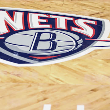 Nov 17, 2021; Brooklyn, New York, USA; The old Nets logo on the court prior to the game between the Cleveland Cavilers and the Brooklyn Nets at Barclays Center. Mandatory Credit: Wendell Cruz-Imagn Images
