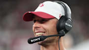 Arizona Cardinals head coach Jonathan Gannon smiles on the sidelines as his team plays against the Las Vegas Raiders at State Farm Stadium in Glendale, on Aug. 23, 2025.