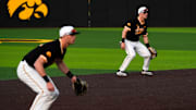 Iowa third baseman Kooper Schulte (9) and shortstop Gable Mitchell (2) ready for a play against Bradley April 16, 2025 at Duane Banks Field in Iowa City, Iowa.