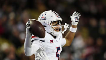 Nov 1, 2025; Boulder, Colorado, USA; Arizona Wildcats wide receiver Gio Richardson (5) reacts during the second half against the Colorado Buffaloes at Folsom Field. Mandatory Credit: Ron Chenoy-Imagn Images