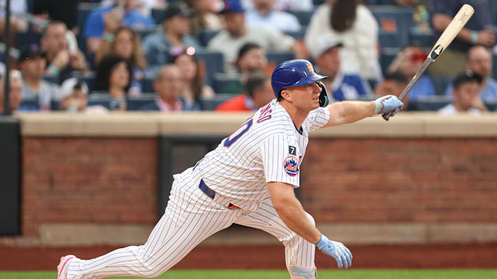 New York Mets first baseman Pete Alonso (20) hits an RBI double during the first inning against the Washington Nationals at Citi Field on June 11. New York Mets first baseman Pete Alonso (20) hits an RBI double during the first inning against the Washington Nationals at Citi Field on June 11.