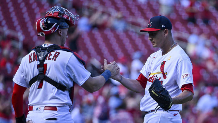 Sep 3, 2023; St. Louis, Missouri, USA;  St. Louis Cardinals relief pitcher Giovanny Gallegos (65) and catcher Andrew Knizner (7) celebrate after the Cardinals defeated the Pittsburgh Pirates at Busch Stadium. Mandatory Credit: Jeff Curry-USA TODAY Sports