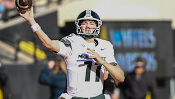 Nov 22, 2025; Iowa City, Iowa, USA; Michigan State Spartans quarterback Alessio Milivojevic (11) warms up before the game against the Iowa Hawkeyes at Kinnick Stadium. Mandatory Credit: Jeffrey Becker-Imagn Images