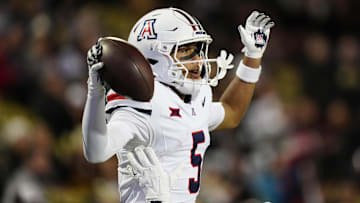 Nov 1, 2025; Boulder, Colorado, USA; Arizona Wildcats wide receiver Gio Richardson (5) reacts during the second half against the Colorado Buffaloes at Folsom Field. Mandatory Credit: Ron Chenoy-Imagn Images