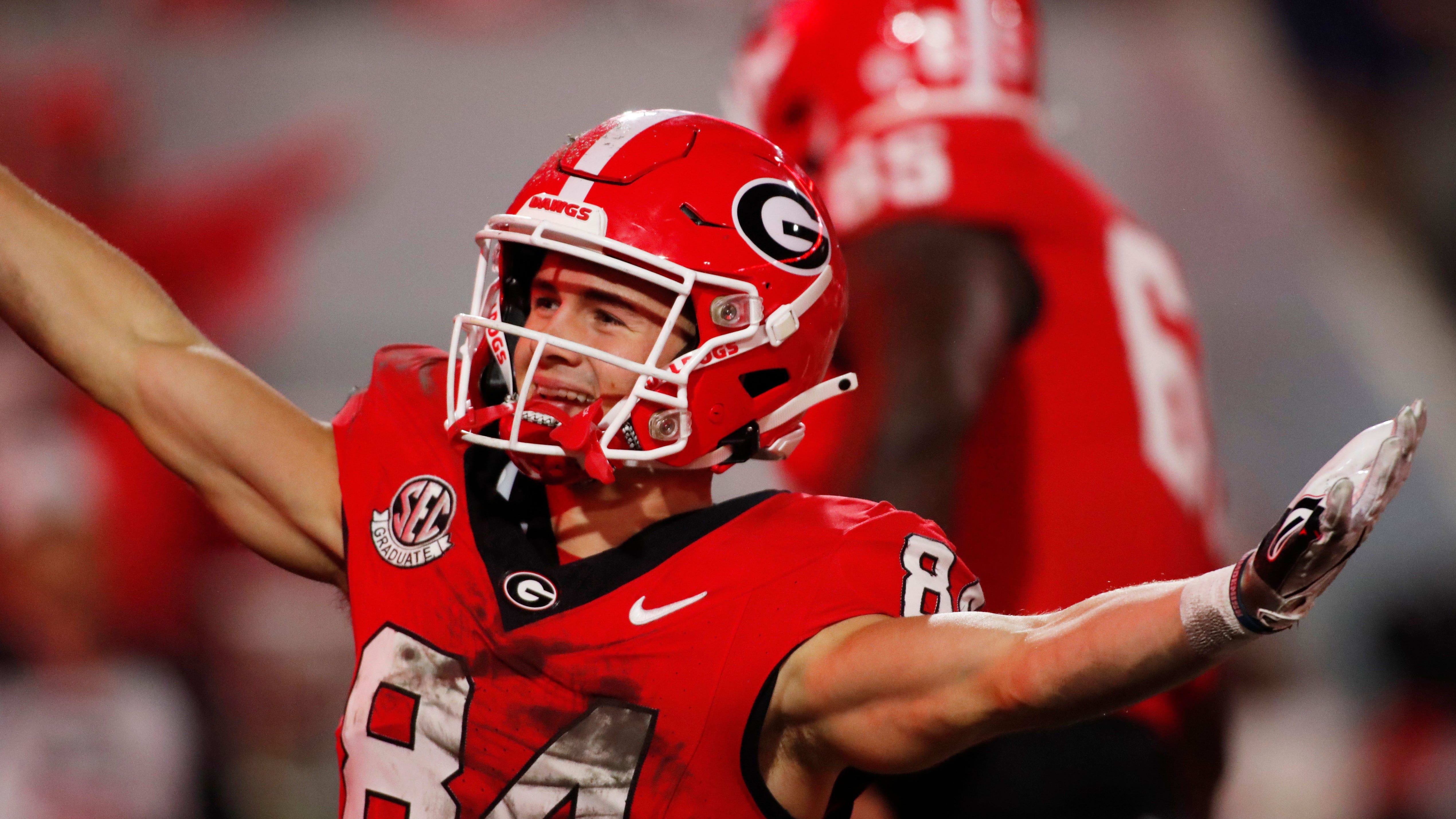 Georgia wide receiver Ladd McConkey (84) celebrates with his teammates after scoring a touchdown