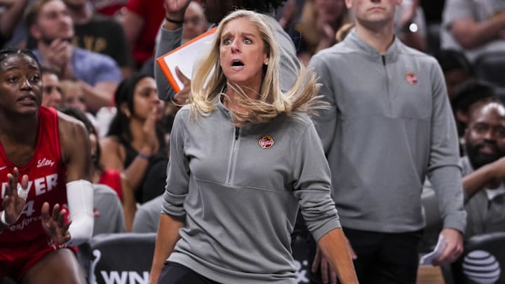 Sep 13, 2024; Indianapolis, Indiana, USA;  Indiana Fever head coach Christie Sides reacts to a call Friday, Sept. 13, 2024, during a game between the Indiana Fever and the Las Vegas Aces on Friday, Sept. 13, 2024, at Gainbridge Fieldhouse in Indianapolis. The Aces defeated the Fever, 78-74. Mandatory Credit: Grace Smith/USA TODAY Network via Imagn Images