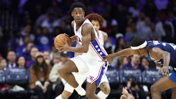 Oct 17, 2025; Philadelphia, Pennsylvania, USA; Philadelphia 76ers guard Vj Edgecombe (77) picks up a loose ball against the Minnesota Timberwolves during the third quarter at Xfinity Mobile Arena. Mandatory Credit: Bill Streicher-Imagn Images