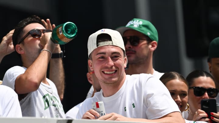 Jun 21, 2024; Boston, MA, USA; Boston Celtics guard Payton Pritchard (11) rides in a duck boat  during the 2024 NBA Championship parade in Boston. Mandatory Credit: Brian Fluharty-USA TODAY Sports