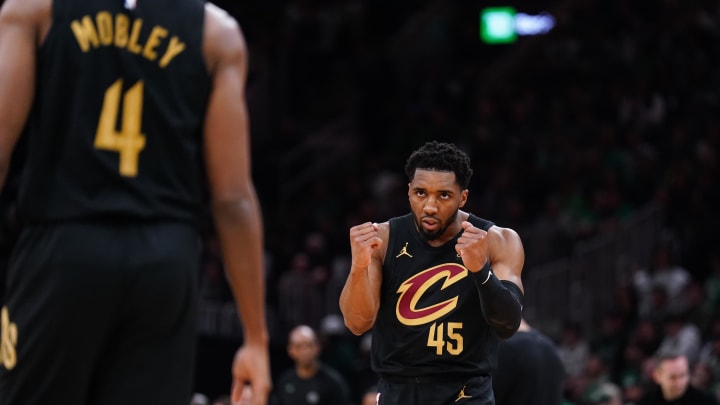 May 9, 2024; Boston, Massachusetts, USA; Cleveland Cavaliers guard Donovan Mitchell (45) reacts after a basket buy forward Evan Mobley (4) against the Boston Celtics in the first quarter during game two of the second round for the 2024 NBA playoffs at TD Garden. Mandatory Credit: David Butler II-USA TODAY Sports