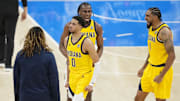 Indiana Pacers guard Tyrese Haliburton, forward Aaron Nesmith and forward Obi Toppin react after a play against the Oklahoma City Thunder in game one of the 2025 NBA Finals at Paycom Center. 