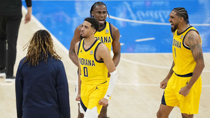 Jun 5, 2025; Oklahoma City, Oklahoma, USA; Indiana Pacers guard Tyrese Haliburton (0), forward Aaron Nesmith (center) and forward Obi Toppin (1) react after a play against the Oklahoma City Thunder in game one of the 2025 NBA Finals at Paycom Center. Mandatory Credit: Kyle Terada-Imagn Images