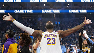 Jan 25, 2025; San Francisco, California, USA; Los Angeles Lakers forward LeBron James (23) throws powder into the air before the game against the Golden State Warriors at Chase Center. Mandatory Credit: Darren Yamashita-Imagn Images