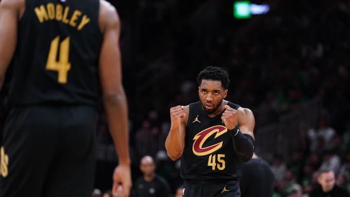 May 9, 2024; Boston, Massachusetts, USA; Cleveland Cavaliers guard Donovan Mitchell (45) reacts after a basket buy forward Evan Mobley (4) against the Boston Celtics in the first quarter during game two of the second round for the 2024 NBA playoffs at TD Garden. Mandatory Credit: David Butler II-USA TODAY Sports