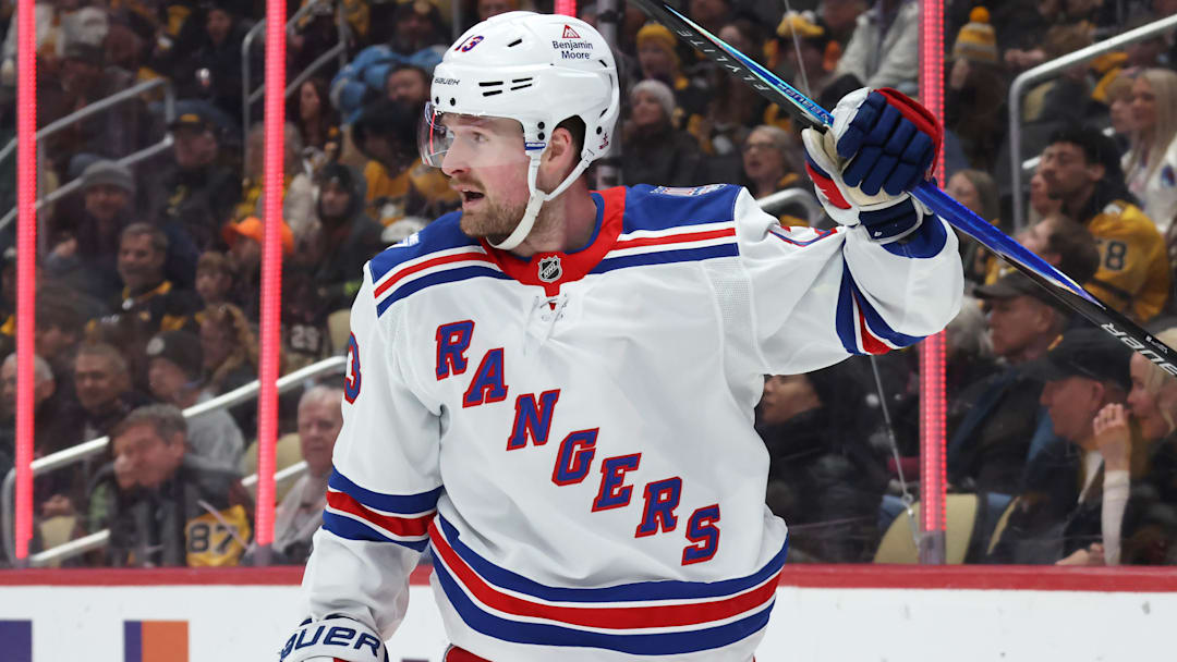 Jan 31, 2026; Pittsburgh, Pennsylvania, USA;  New York Rangers left wing Alexis Lafreniere (13) celebrates his power play goal against the Pittsburgh Penguins during the second period at PPG Paints Arena. Mandatory Credit: Charles LeClaire-Imagn Images