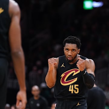 May 9, 2024; Boston, Massachusetts, USA; Cleveland Cavaliers guard Donovan Mitchell (45) reacts after a basket buy forward Evan Mobley (4) against the Boston Celtics in the first quarter during game two of the second round for the 2024 NBA playoffs at TD Garden. Mandatory Credit: David Butler II-Imagn Images