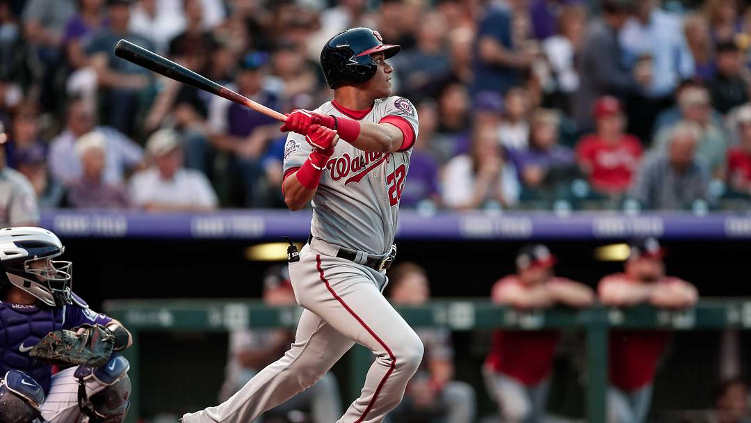 Sep 29, 2018; Denver, CO, USA; Washington Nationals left fielder Juan Soto (22) watches his ball on a two RBI double in the first inning against the Colorado Rockies at Coors Field. Mandatory Credit: Isaiah J. Downing-Imagn Images