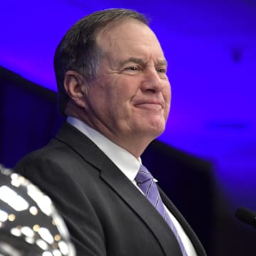 Feb 4, 2019; Atlanta, GA, USA; New England Patriots coach Bill Belichick speaks flanked by the Vince Lombardi trophy during Super Bowl LIII winning team press conference at Georgia World Congress Center. The Patriots defeated the Los Angeles Rams 13-3 to win an NFL record-tying sixth championship  Mandatory Credit: Kirby Lee-Imagn Images