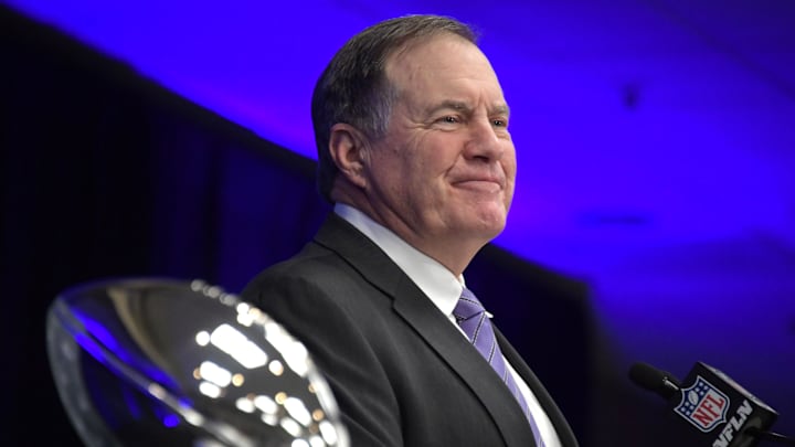 Feb 4, 2019; Atlanta, GA, USA; New England Patriots coach Bill Belichick speaks flanked by the Vince Lombardi trophy during Super Bowl LIII winning team press conference at Georgia World Congress Center. The Patriots defeated the Los Angeles Rams 13-3 to win an NFL record-tying sixth championship  Mandatory Credit: Kirby Lee-Imagn Images