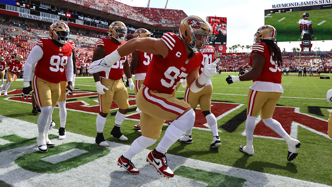 Nov 10, 2024; Tampa, Florida, USA; San Francisco 49ers defensive end Nick Bosa (97) and teammates practice against the Tampa Bay Buccaneers prior to the game at Raymond James Stadium. Mandatory Credit: Kim Klement Neitzel-Imagn Images