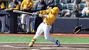 West Virginia University infielder Sam White lifts a three-run home run in the bottom of the first inning against Kennesaw State.