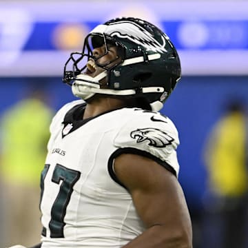 Nov 24, 2024; Inglewood, California, USA;  Philadelphia Eagles linebacker Nakobe Dean (17) reacts after sacking Los Angeles Rams quarterback Matthew Stafford (not pictured) during the first half at SoFi Stadium. Mandatory Credit: Alex Gallardo-Imagn Images